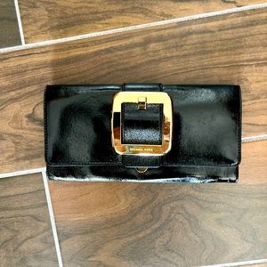 Michael Kors black patent leather clutch. Used once.